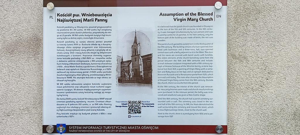 Tabliczka z informacją o kościele pw. Wniebowzięcia Najświętszej Marii Panny